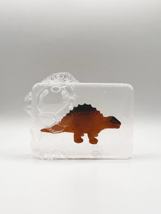 Savon Transparent Artisanal avec Figurine Dinosaure Stegosaurus